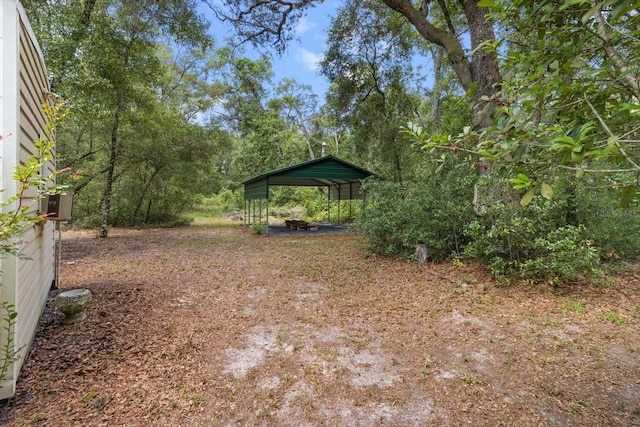 2105 E Dearborn Dr, Hernando, FL 34442 - view of yard with a carport