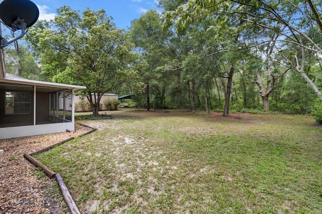 2105 E Dearborn Dr, Hernando, FL 34442 - view of green lawn featuring a sunroom