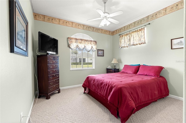 5543 NW 25th Loop, Ocala, FL 34482 - carpeted bedroom with baseboards and ceiling fan