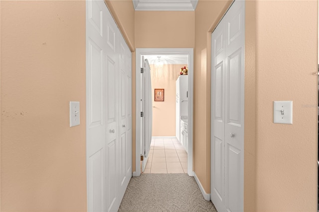 5543 NW 25th Loop, Ocala, FL 34482 - hallway featuring ornamental molding, light tile patterned floors, and light carpet