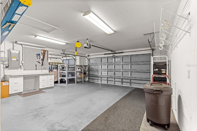 5543 NW 25th Loop, Ocala, FL 34482 - garage featuring electric panel and a garage door opener