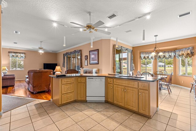 5543 NW 25th Loop, Ocala, FL 34482 - kitchen featuring white dishwasher, ceiling fan, light tile patterned flooring, ornamental molding, and open floor plan