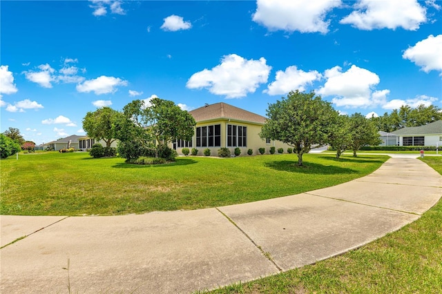 5543 NW 25th Loop, Ocala, FL 34482 - view of front of property featuring a front lawn and stucco siding