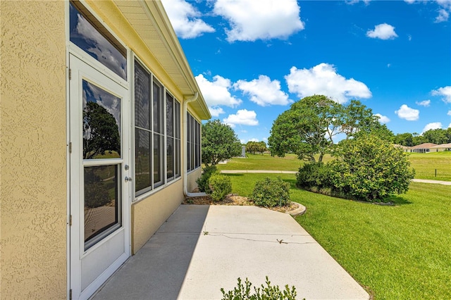 5543 NW 25th Loop, Ocala, FL 34482 - view of grassy yard with a patio area