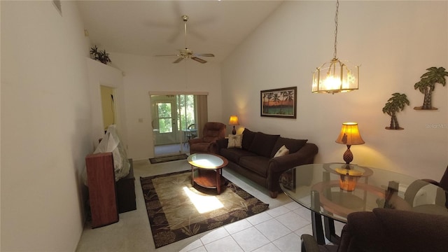 6421 Remus Dr, New Port Richey, FL 34653 - tiled living room featuring a chandelier, high vaulted ceiling, and a ceiling fan