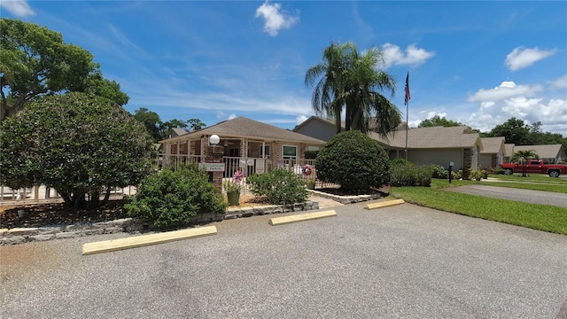 6421 Remus Dr, New Port Richey, FL 34653 - single story home with uncovered parking and brick siding