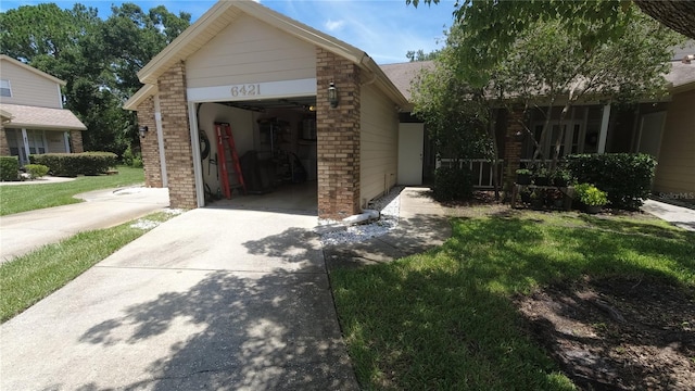 6421 Remus Dr, New Port Richey, FL 34653 - garage featuring driveway