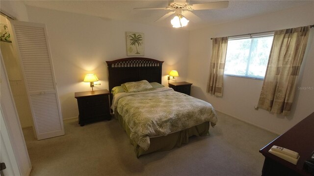 6421 Remus Dr, New Port Richey, FL 34653 - bedroom with light colored carpet and ceiling fan