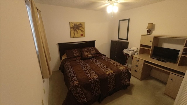 6421 Remus Dr, New Port Richey, FL 34653 - bedroom featuring light colored carpet and a ceiling fan