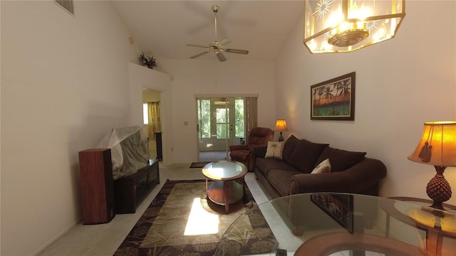 6421 Remus Dr, New Port Richey, FL 34653 - carpeted living area featuring a ceiling fan and high vaulted ceiling