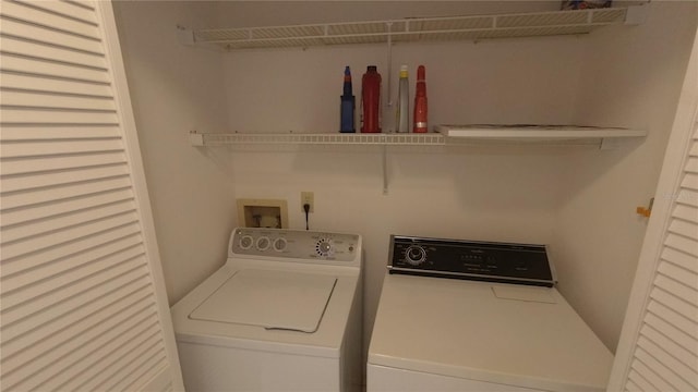 6421 Remus Dr, New Port Richey, FL 34653 - laundry area featuring separate washer and dryer