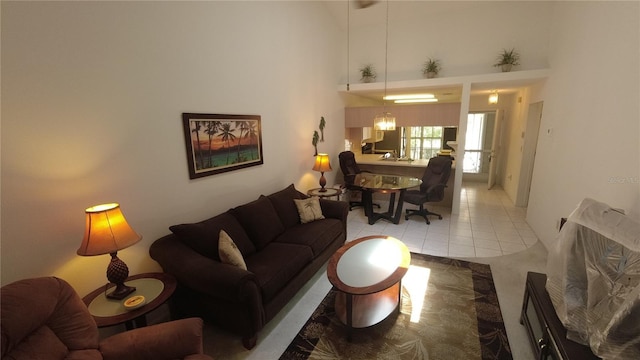 6421 Remus Dr, New Port Richey, FL 34653 - living area with light tile patterned floors and a towering ceiling