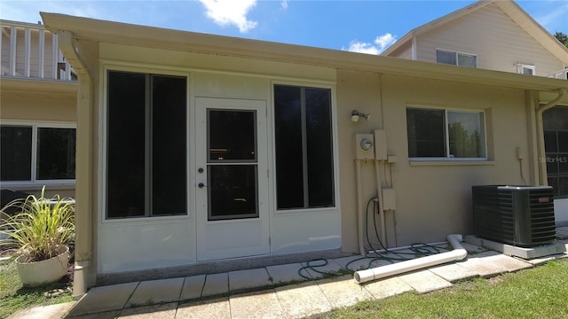 6421 Remus Dr, New Port Richey, FL 34653 - back of house with stucco siding