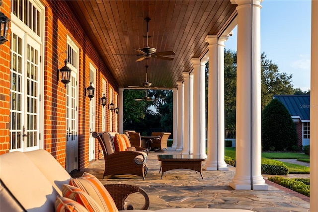 17800 SE 237th Ct, Umatilla, FL 32784 - covered porch with ceiling fan and french doors