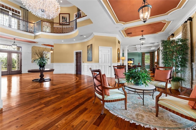 17800 SE 237th Ct, Umatilla, FL 32784 - lobby with crown molding, a decorative wall, wainscoting, and coffered ceiling