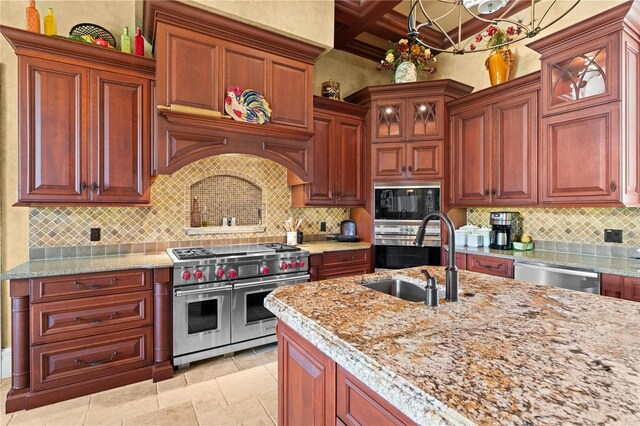 17800 SE 237th Ct, Umatilla, FL 32784 - kitchen with stainless steel appliances, coffered ceiling, backsplash, light stone counters, and glass insert cabinets