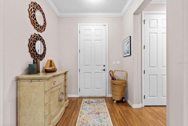 9251 SW 94th Loop, Ocala, FL 34481 - entryway with light wood-style flooring and ornamental molding