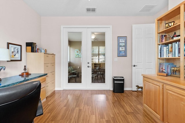 9251 SW 94th Loop, Ocala, FL 34481 - office area featuring french doors and light wood-style floors