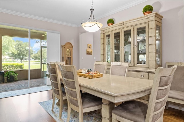 9251 SW 94th Loop, Ocala, FL 34481 - dining area featuring ornamental molding and wood finished floors