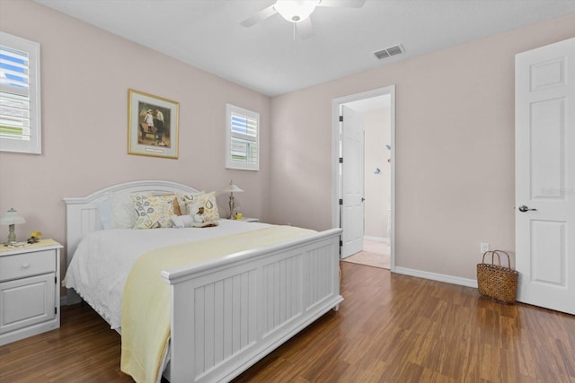 9251 SW 94th Loop, Ocala, FL 34481 - bedroom with dark wood-type flooring and ceiling fan