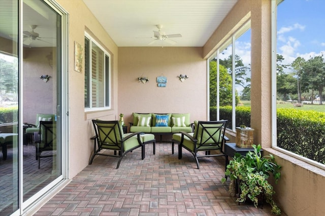 9251 SW 94th Loop, Ocala, FL 34481 - sunroom featuring ceiling fan, outdoor lounge area, and healthy amount of natural light