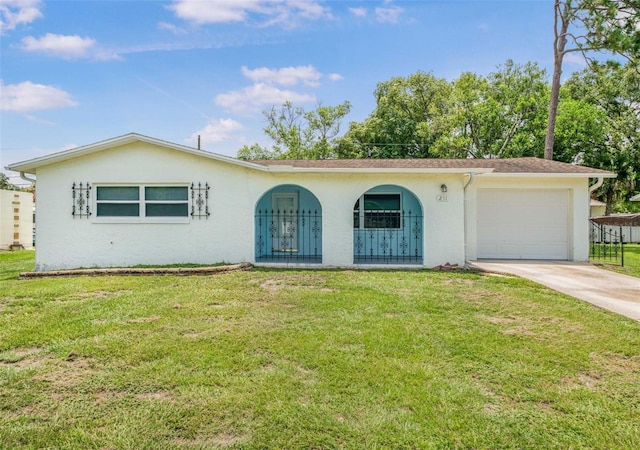 231 S Barbour St, Beverly Hills, FL 34465 - single story home featuring stucco siding, driveway, and a front yard