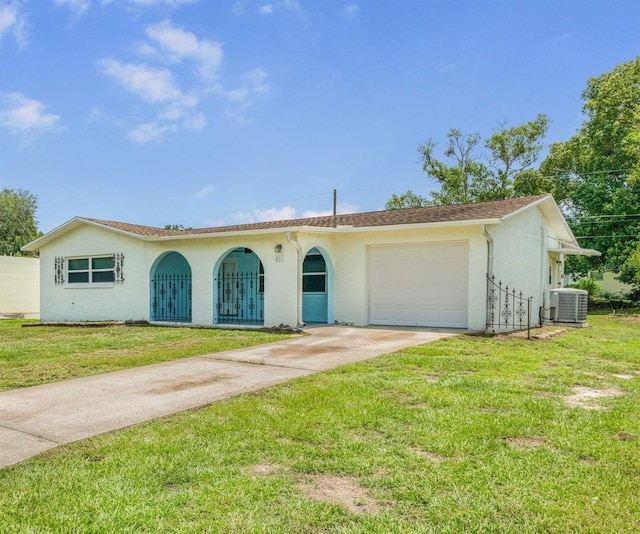 231 S Barbour St, Beverly Hills, FL 34465 - ranch-style house featuring a garage, stucco siding, driveway, and a front yard