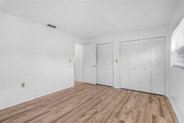 231 S Barbour St, Beverly Hills, FL 34465 - unfurnished bedroom with multiple closets and light wood finished floors