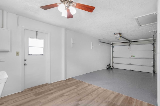 231 S Barbour St, Beverly Hills, FL 34465 - garage with a ceiling fan