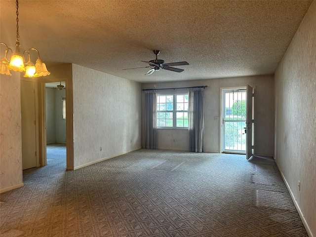 8470 SW 92nd Ln Unit F, Ocala, FL 34481 - carpeted spare room featuring a chandelier, a ceiling fan, and a textured ceiling
