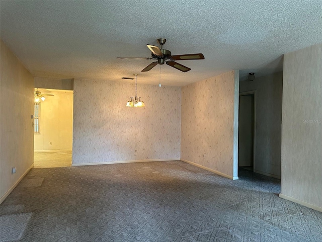 8470 SW 92nd Ln Unit F, Ocala, FL 34481 - unfurnished room with a ceiling fan, carpet flooring, and a textured ceiling