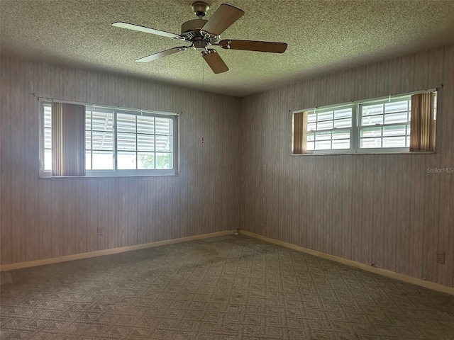 8470 SW 92nd Ln Unit F, Ocala, FL 34481 - spare room with a textured ceiling and a ceiling fan