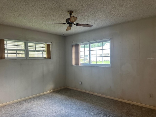 8470 SW 92nd Ln Unit F, Ocala, FL 34481 - empty room featuring a ceiling fan and a textured ceiling