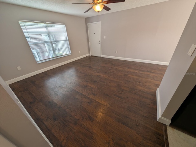 2564 SE 15th Ave Unit G, Ocala, FL 34471 - empty room with ceiling fan, wood finished floors, and a textured ceiling