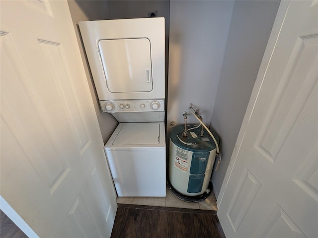 2564 SE 15th Ave Unit G, Ocala, FL 34471 - laundry area featuring stacked washer and clothes dryer and electric water heater