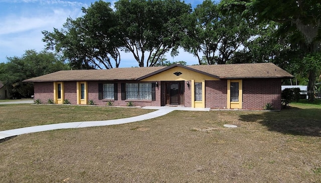406WRIGHTST Wright St, Inverness, FL 34452 - ranch-style home with brick siding and a front yard