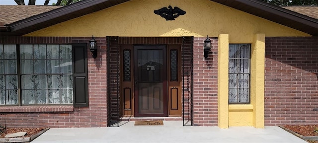 406WRIGHTST Wright St, Inverness, FL 34452 - property entrance featuring brick siding and stucco siding