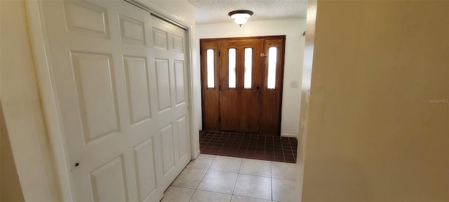 406WRIGHTST Wright St, Inverness, FL 34452 - entryway with a textured ceiling and light tile patterned flooring