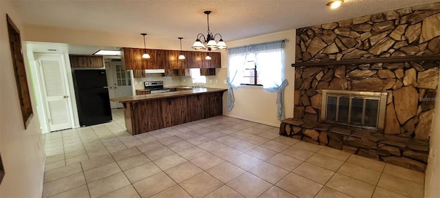 406WRIGHTST Wright St, Inverness, FL 34452 - kitchen with a peninsula, freestanding refrigerator, a chandelier, light tile patterned floors, and electric stove