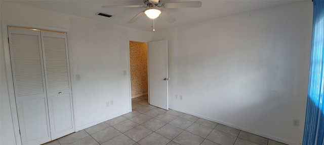 406WRIGHTST Wright St, Inverness, FL 34452 - unfurnished bedroom with a closet, light tile patterned floors, and a ceiling fan