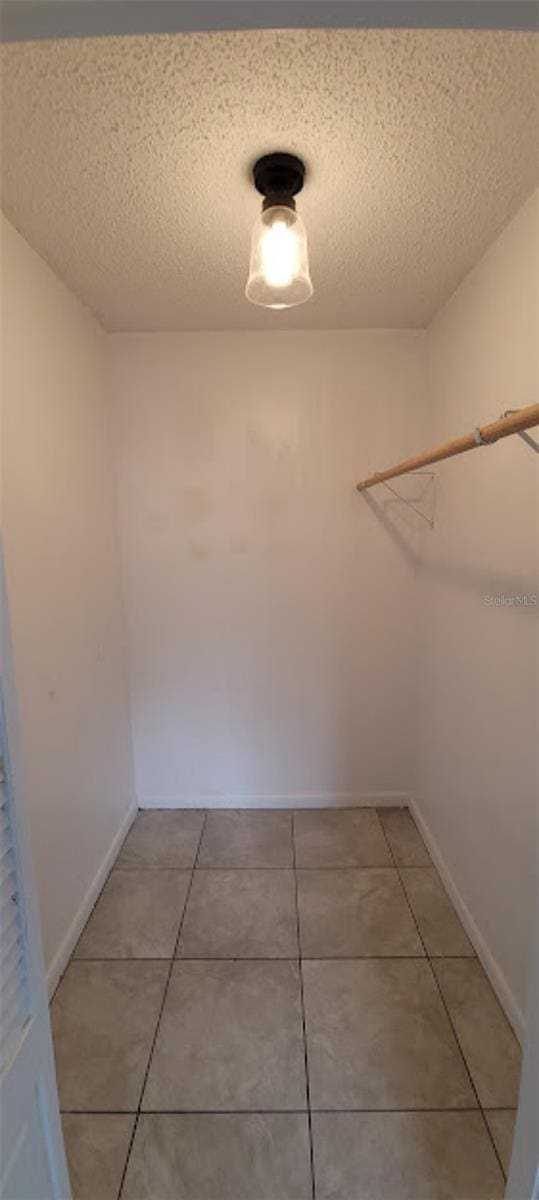 406WRIGHTST Wright St, Inverness, FL 34452 - spacious closet featuring light tile patterned floors