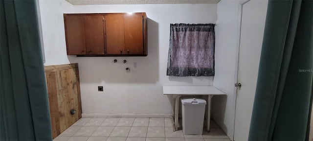 406WRIGHTST Wright St, Inverness, FL 34452 - washroom with light tile patterned floors, cabinet space, washer hookup, and hookup for an electric dryer