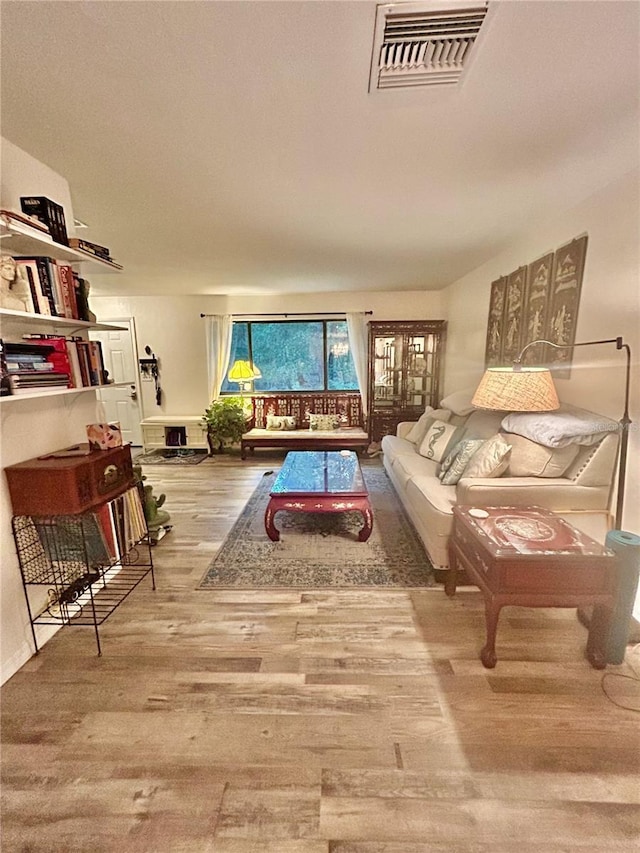 2214 NE 45th Ave Unit 3, Ocala, FL 34470 - living room featuring wood finished floors