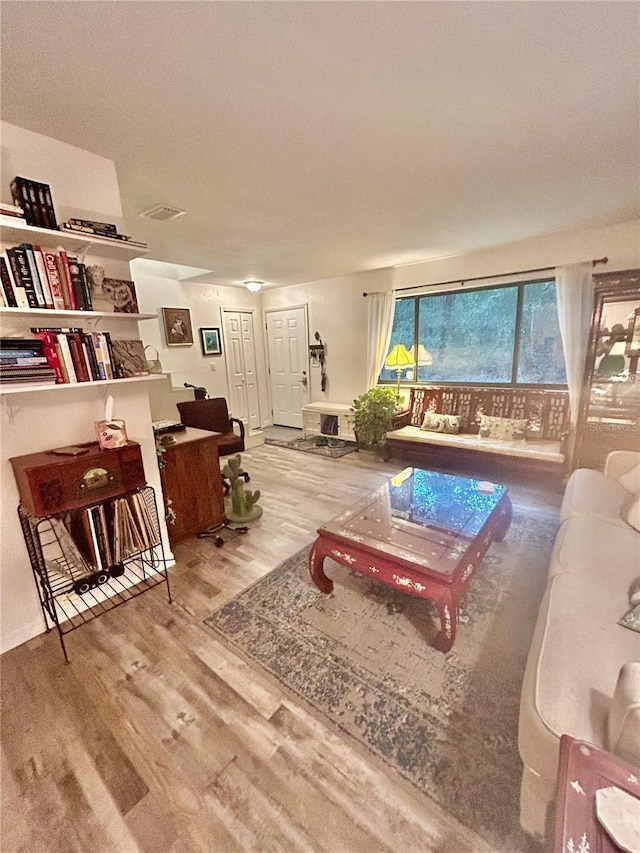 2214 NE 45th Ave Unit 3, Ocala, FL 34470 - living area featuring wood finished floors