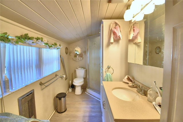 bathroom with vanity, hardwood / wood-style flooring, toilet, a shower with shower door, and wood ceiling