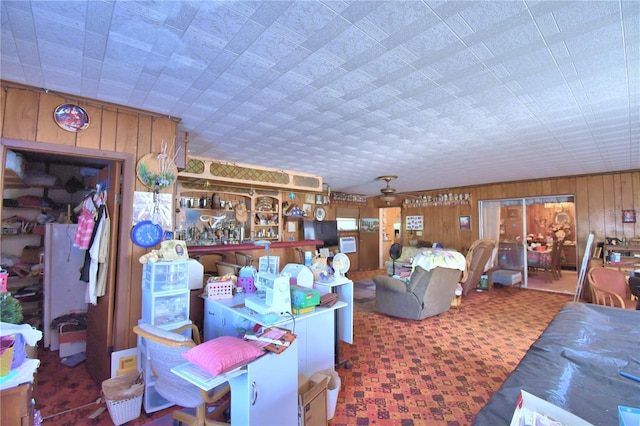 living room featuring wooden walls