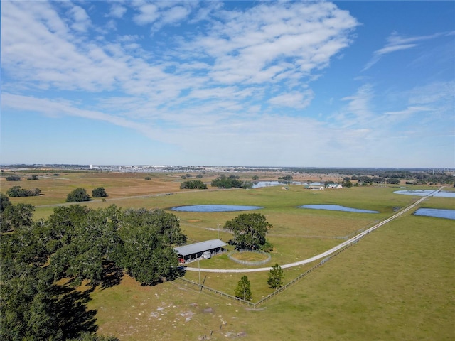 aerial view featuring a water view and a rural view