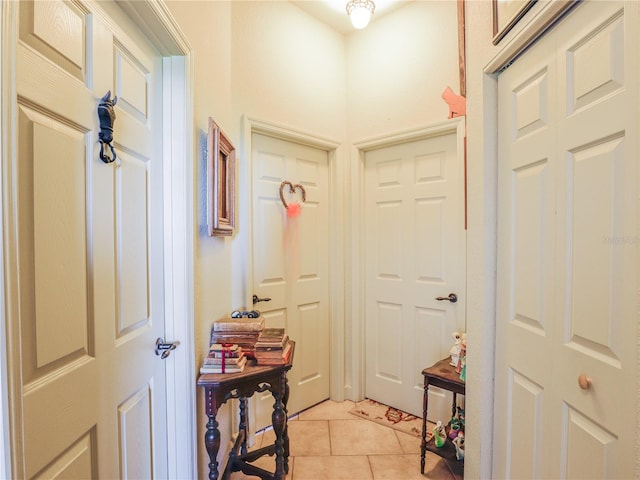 interior space with light tile patterned floors