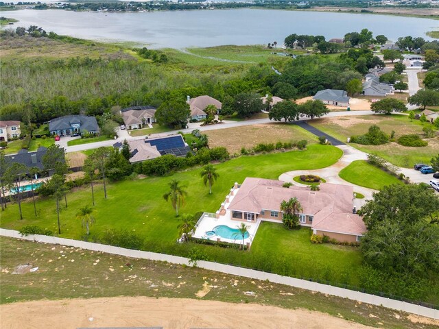 bird's eye view with a water view