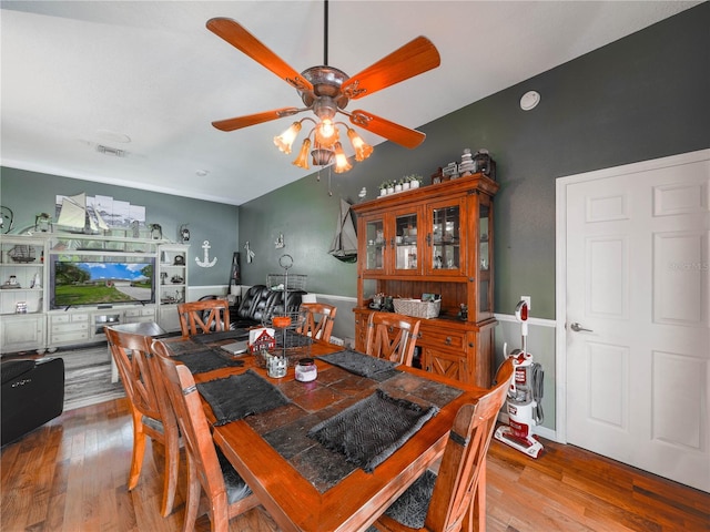 dining area featuring light hardwood / wood-style floors and ceiling fan